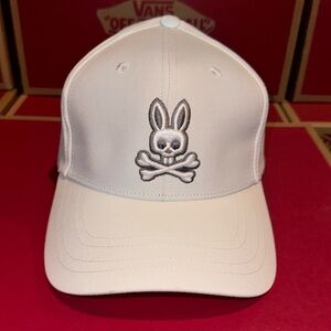 White psycho bunny strap back hat.